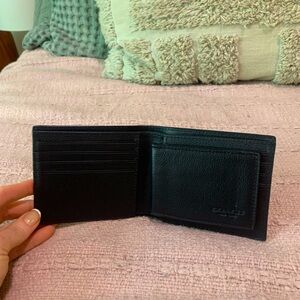 Coach Bi-fold leather wallet black